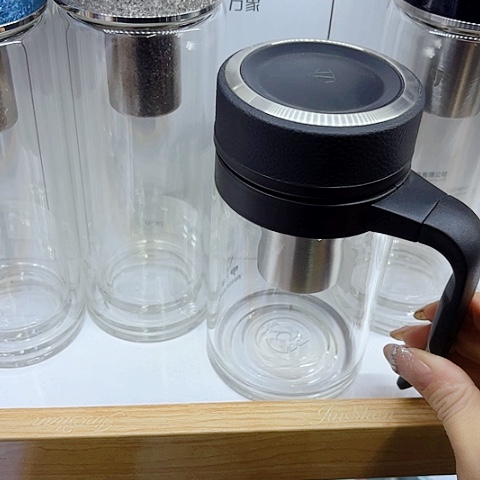 跃***.万象玻璃单层500毫升皮纹把杯