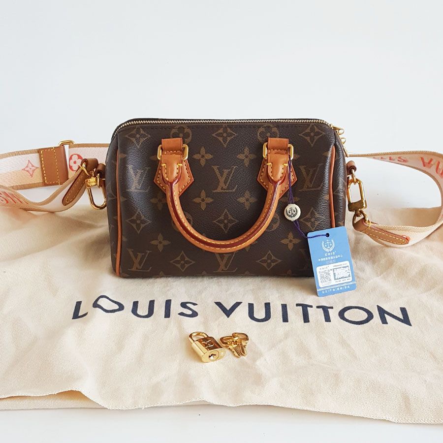 95新 LV LV Speedy95新老花橘色蜜桃色肩带speedy 20手提单肩包