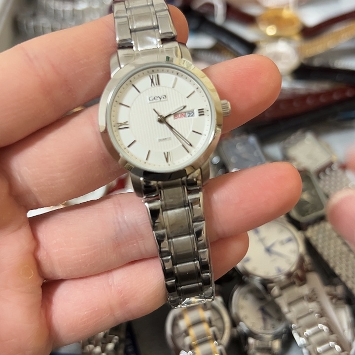 何***丑钢牛皮（革）钢石英机芯