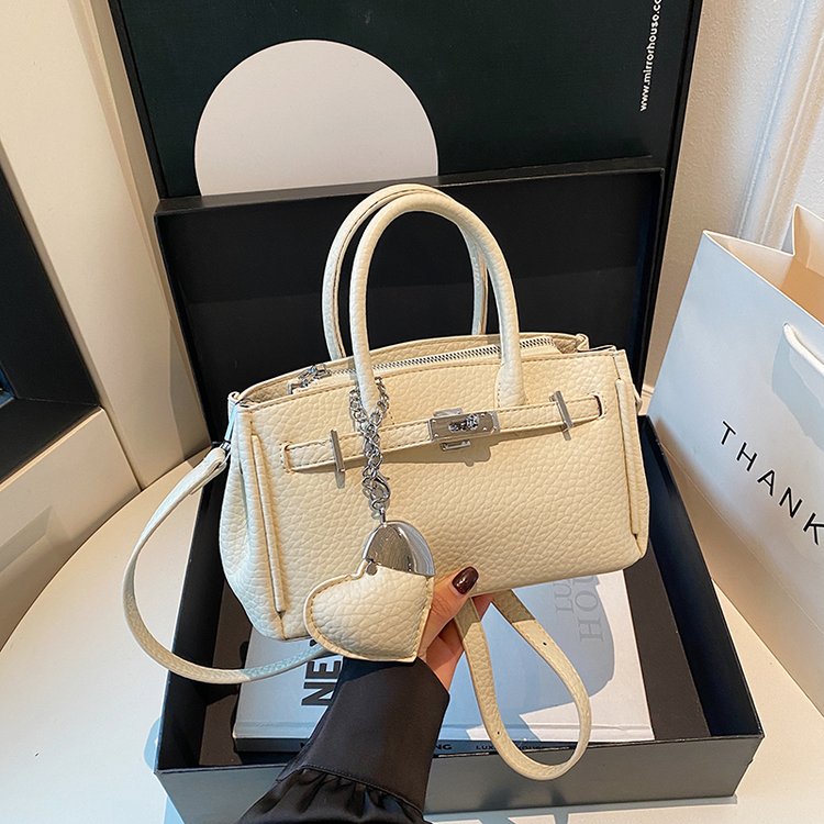 时尚单肩耐磨纯色包斜挎包腋下ins简约小方包58007