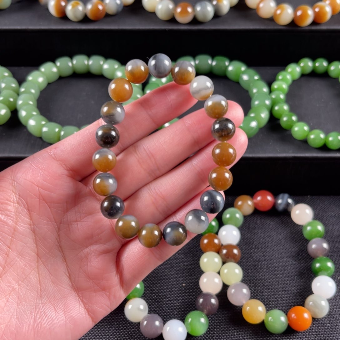 和田玉手串未镶嵌C****卡10颗颗三色浓墨重彩