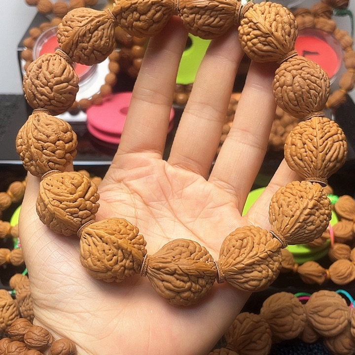 良***子把件桃核五爪龙手持13颗籽