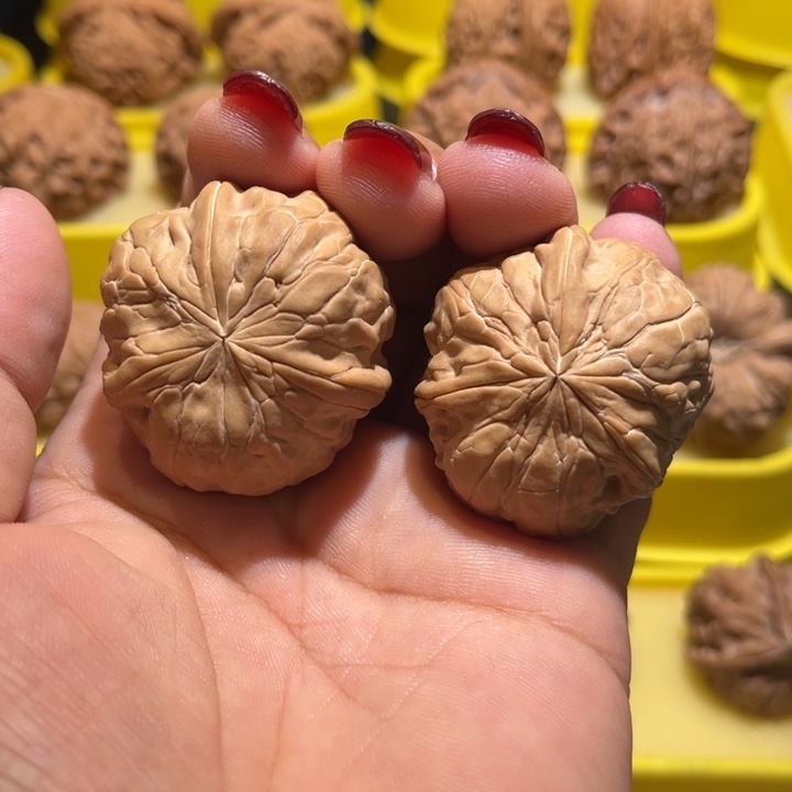 桃核吊坠甲骨文全品三棱