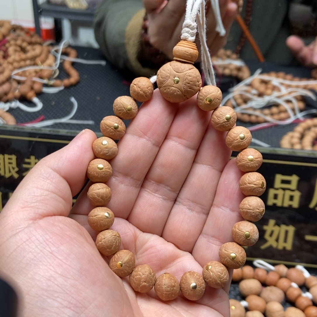凤眼菩提吊坠11.5铜钉手串199