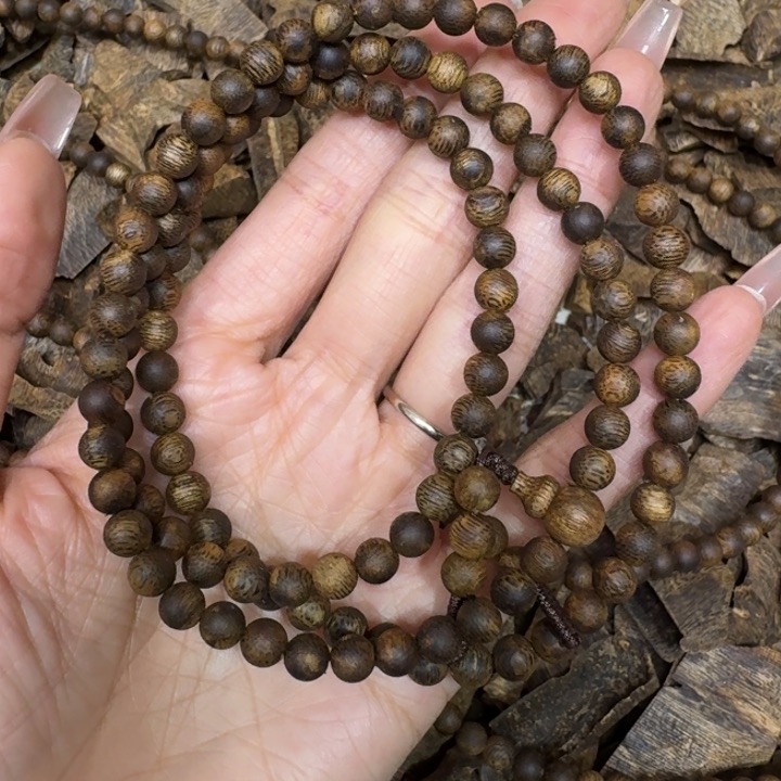沉香手串张勺子沉浮一条