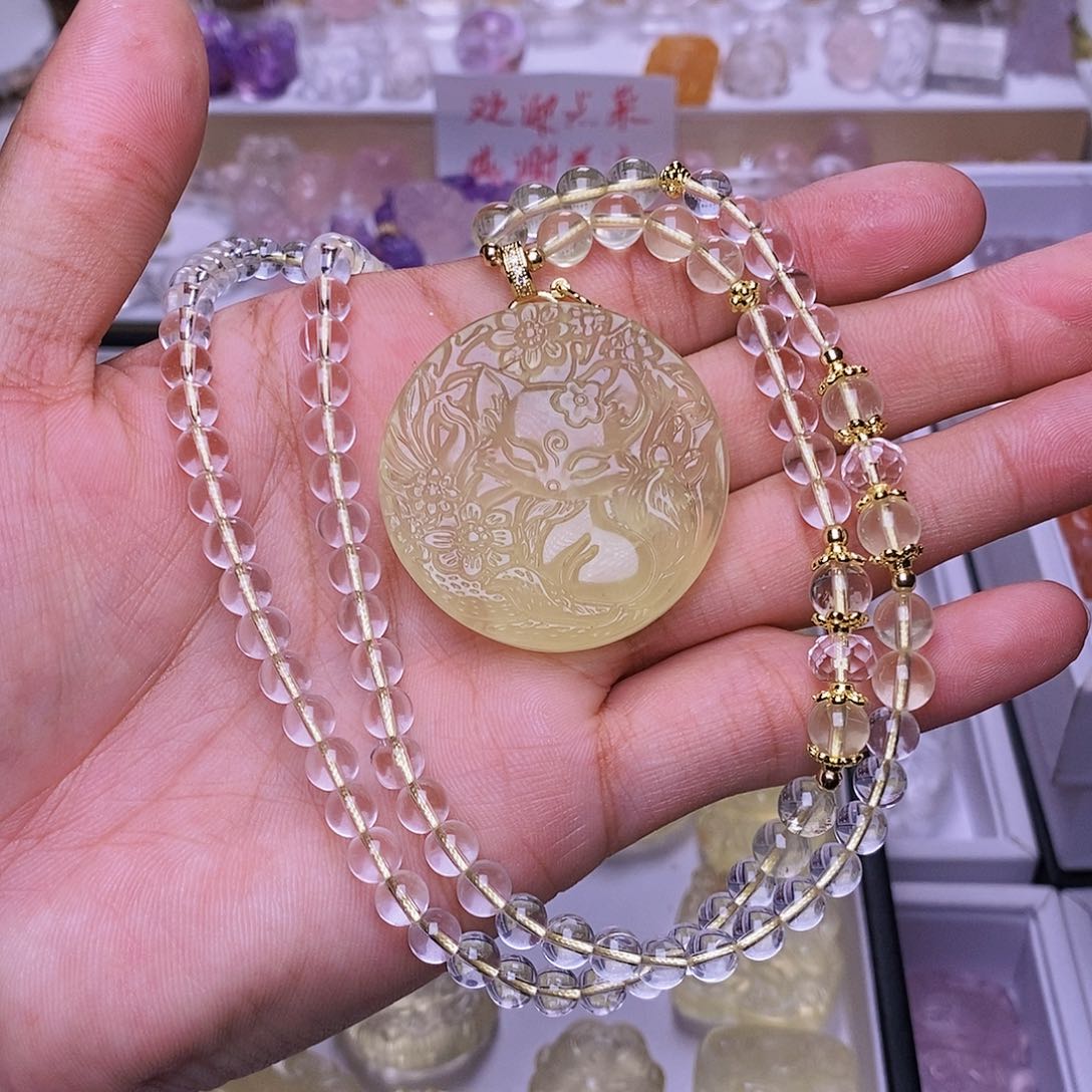 水晶颈饰未镶嵌黄水桃花媚狐吊坠 送链子