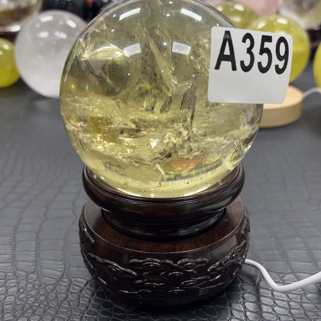 猫***熊石材天然黄水晶球10.1