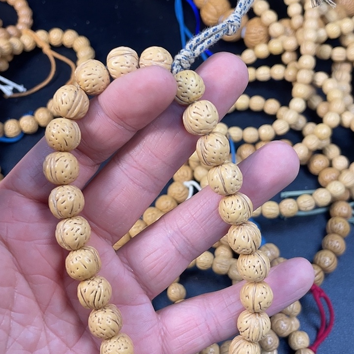 小***飞手串桃核76666666