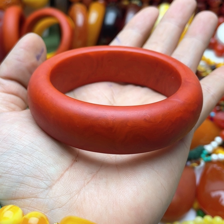 树脂制品94号橘红说手镯