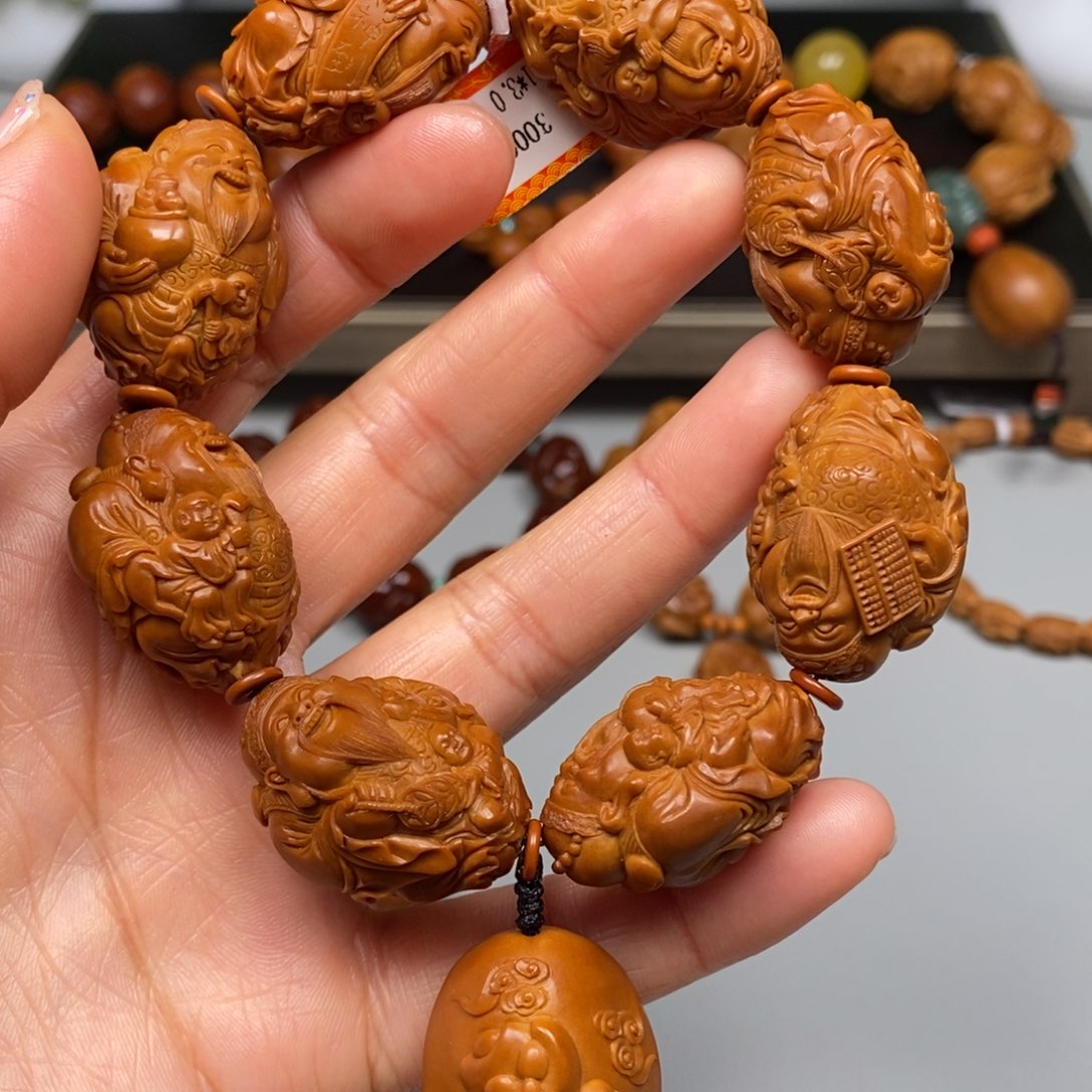 橄榄核吊坠童子财神