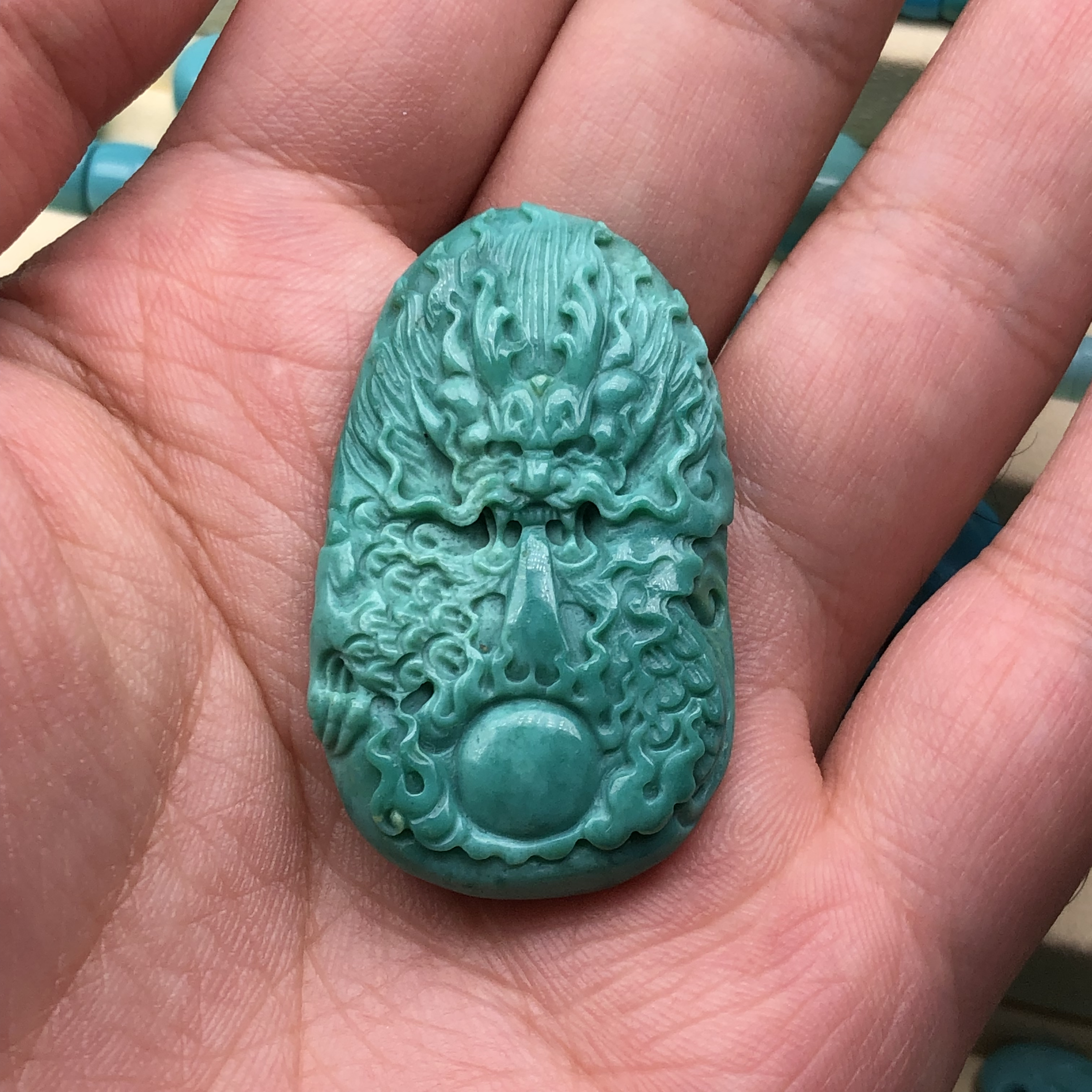 原矿高瓷绿松石龙牌       尺寸25*41*9    重11.6克