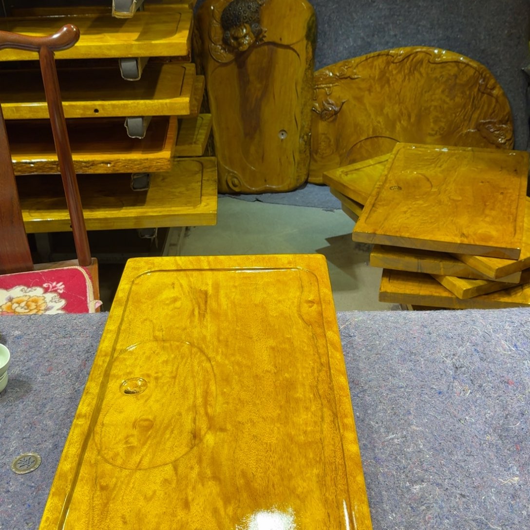 刘***。木整板整料实木茶盘