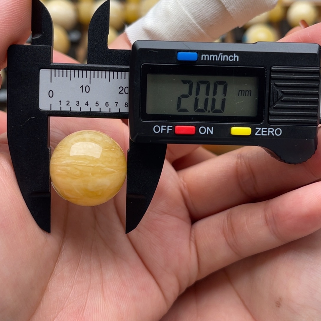 琥珀未镶嵌裸石蜜蜡圆珠笑