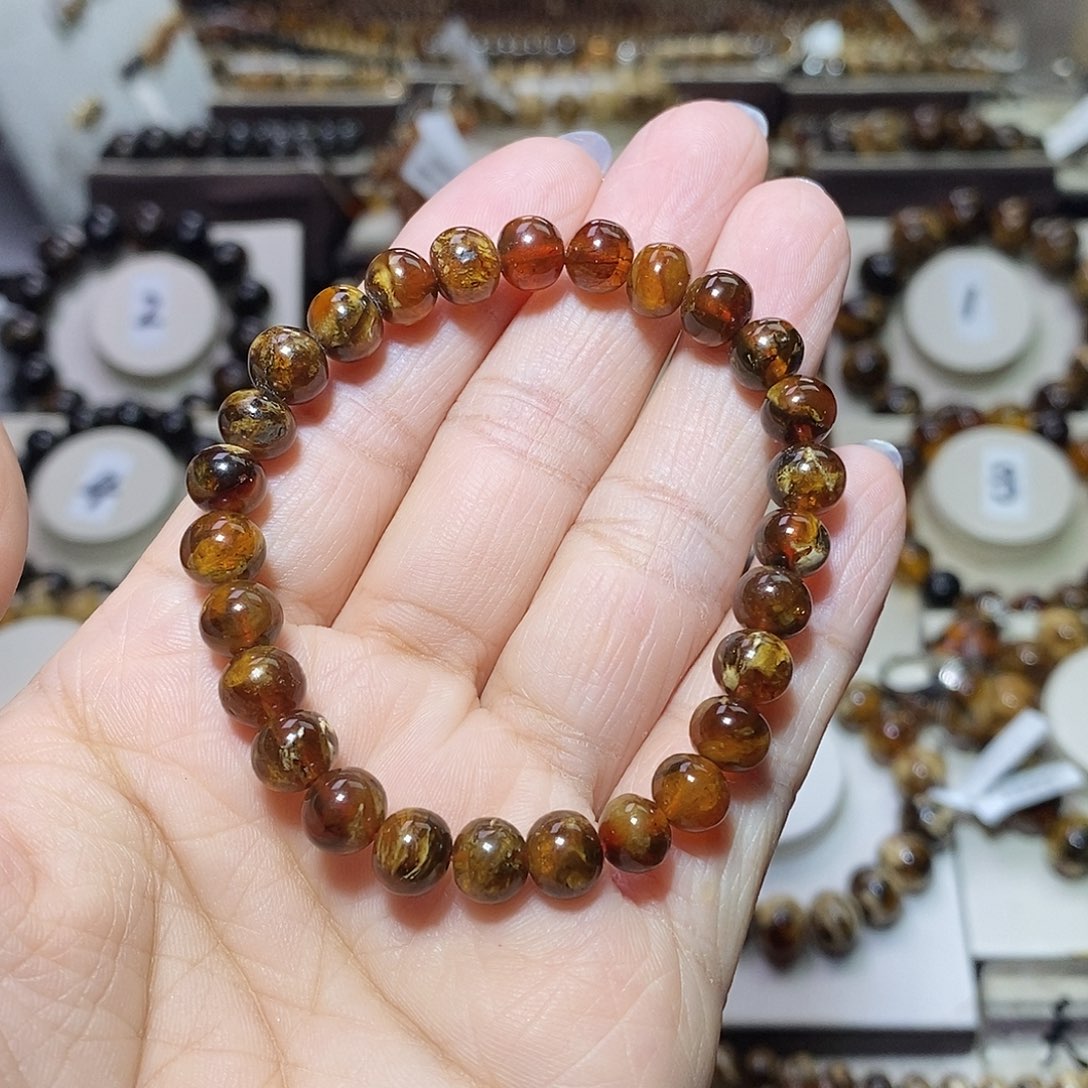 橘***鹿琥珀未镶嵌裸石蜡花7m