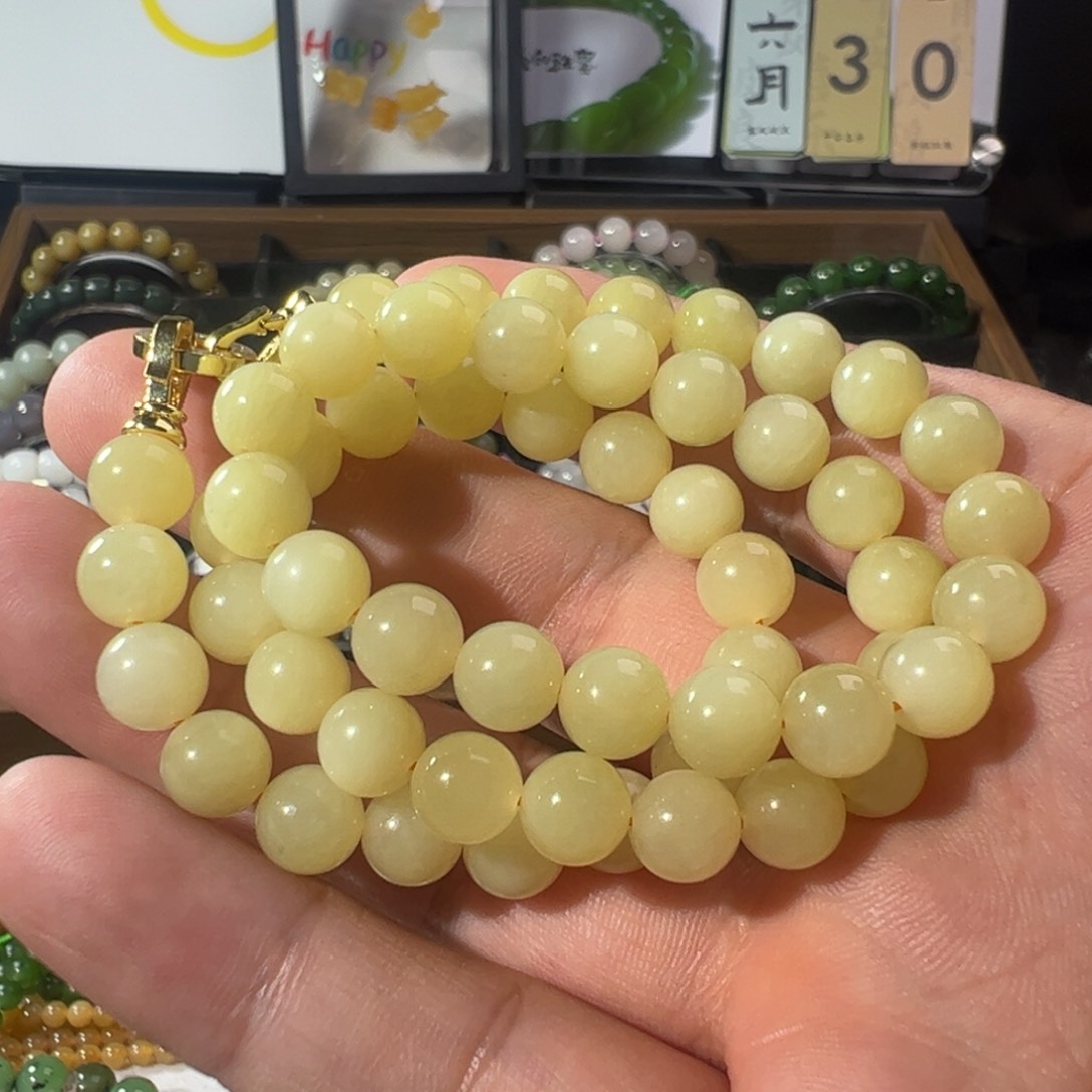 蜡***倩和田玉未镶嵌颈饰