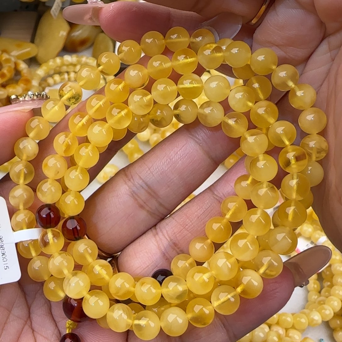 蜜蜡未镶嵌手链鸡油黄金绞蜜佛珠