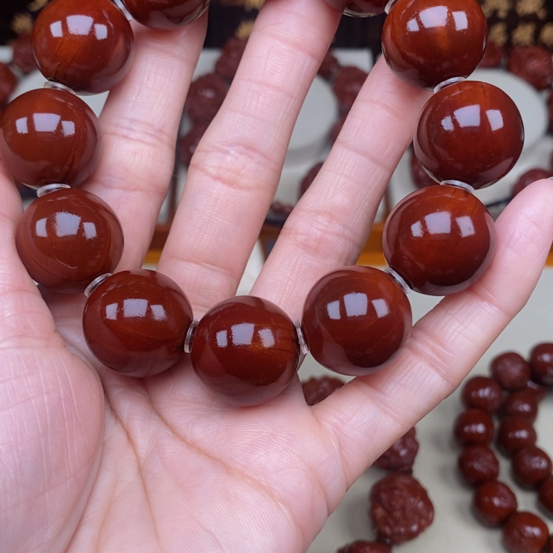 橄榄核吊坠胡*林光珠，