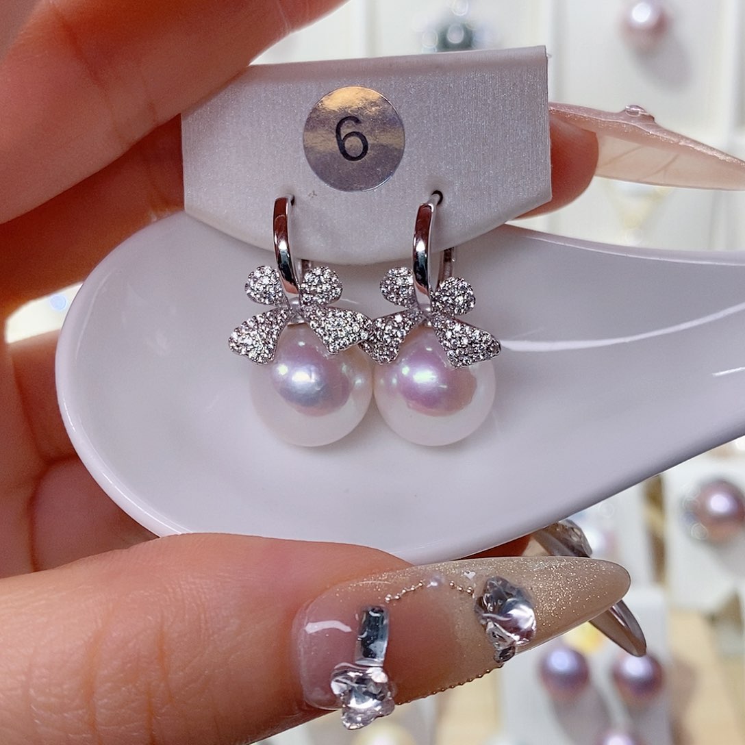 笑***笑银S925镶嵌淡水珍珠耳饰12➕