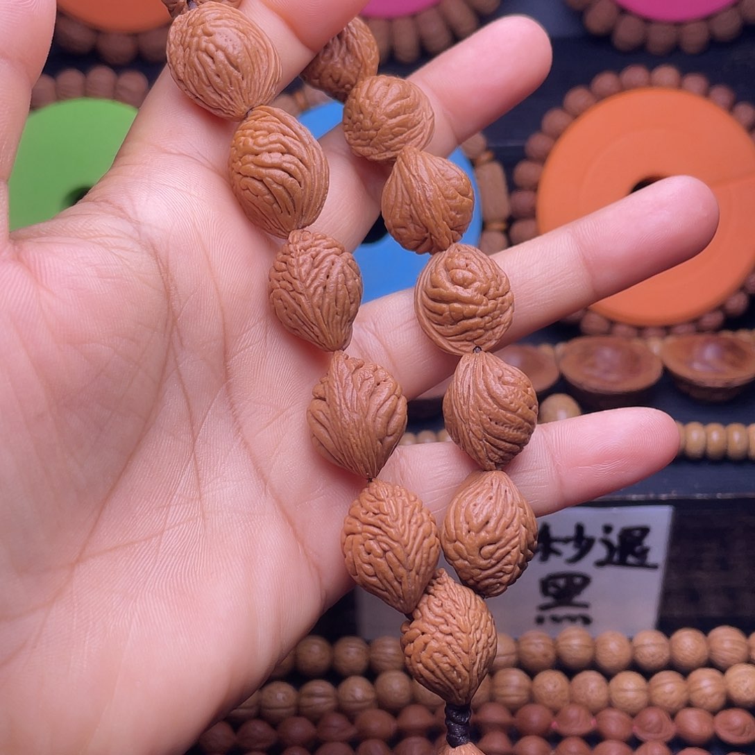 き***꧂桃核吊坠秦岭桃枭手持15颗籽