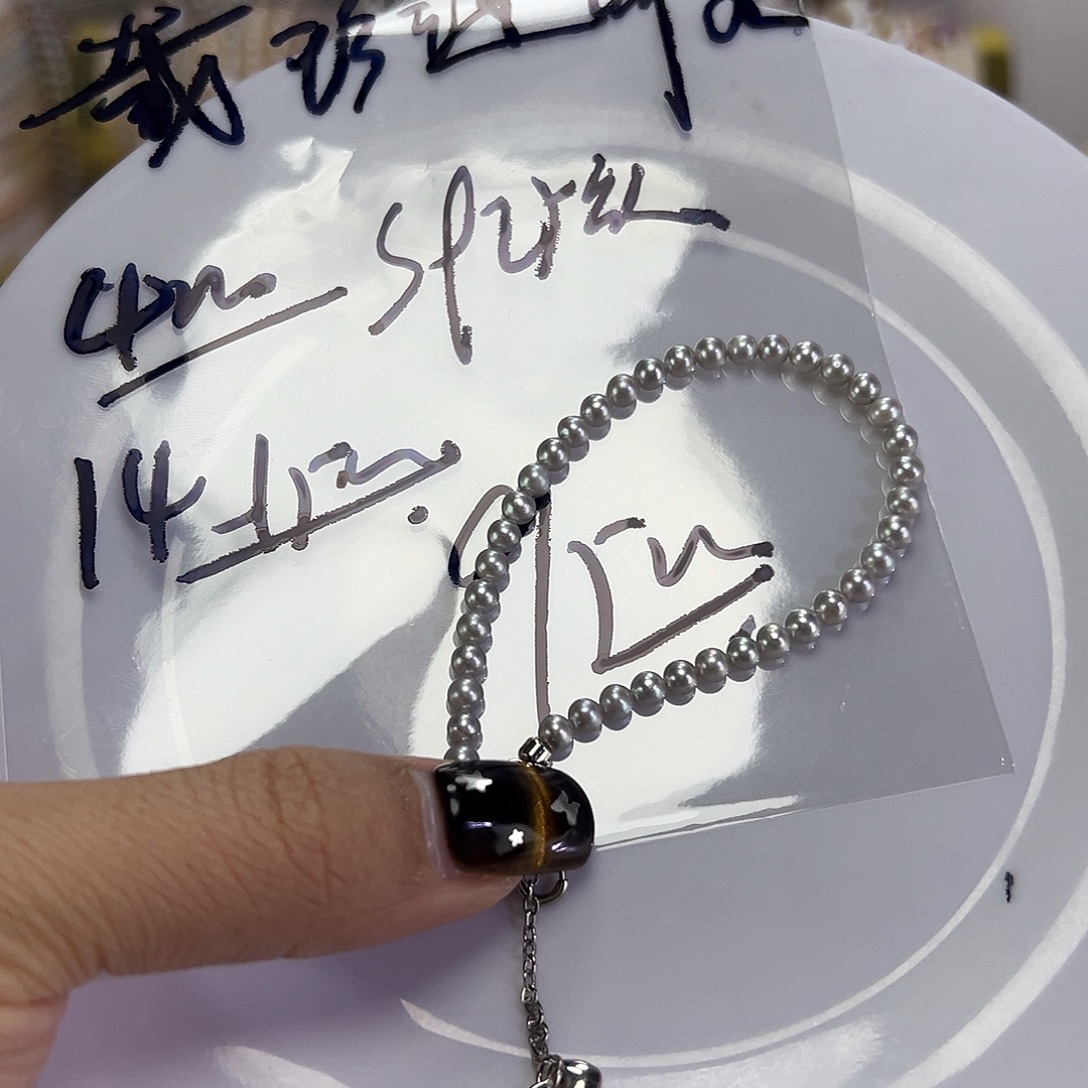 戴***）钛钢手绳淡水珍珠