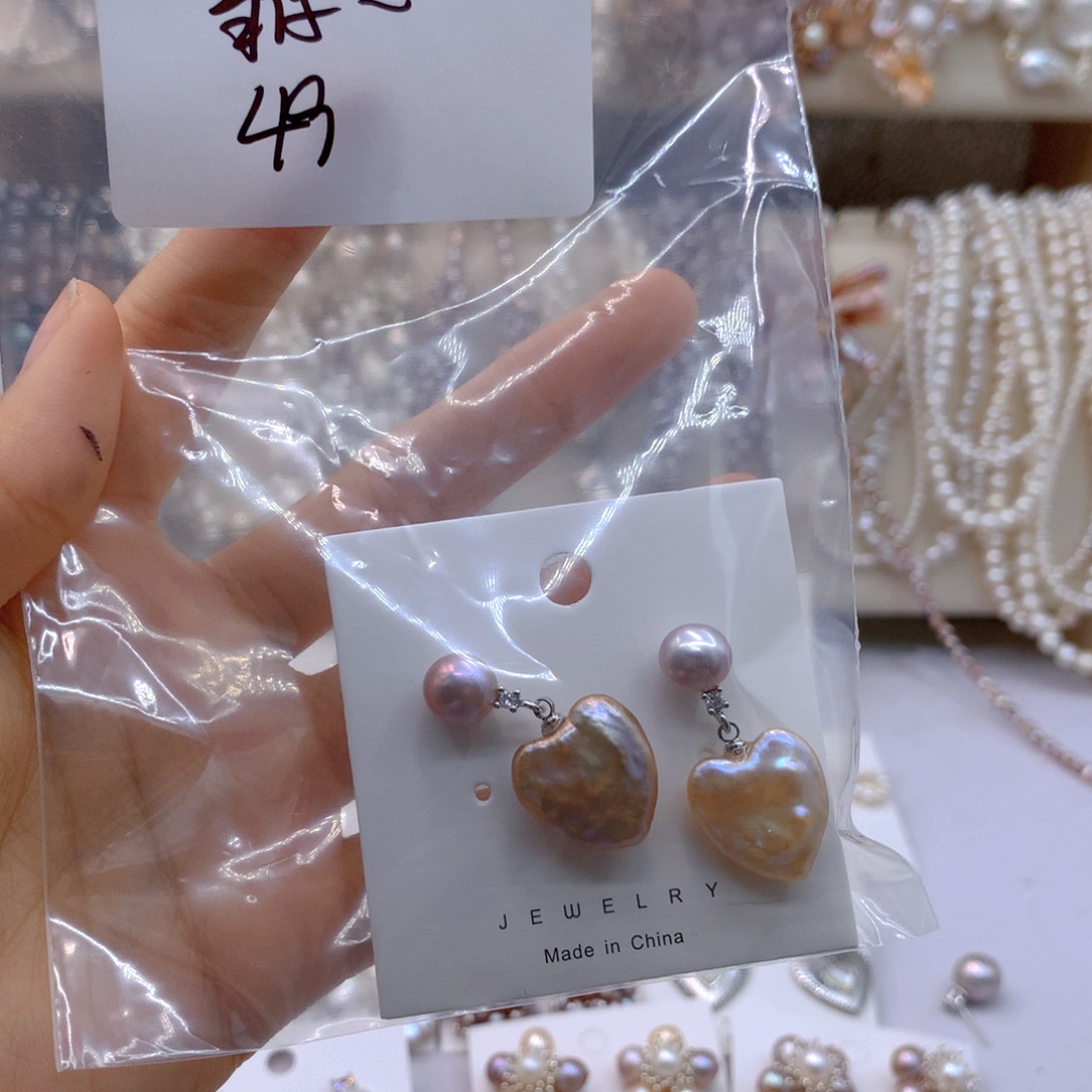 淡水珍珠耳饰银S925镶嵌当****王