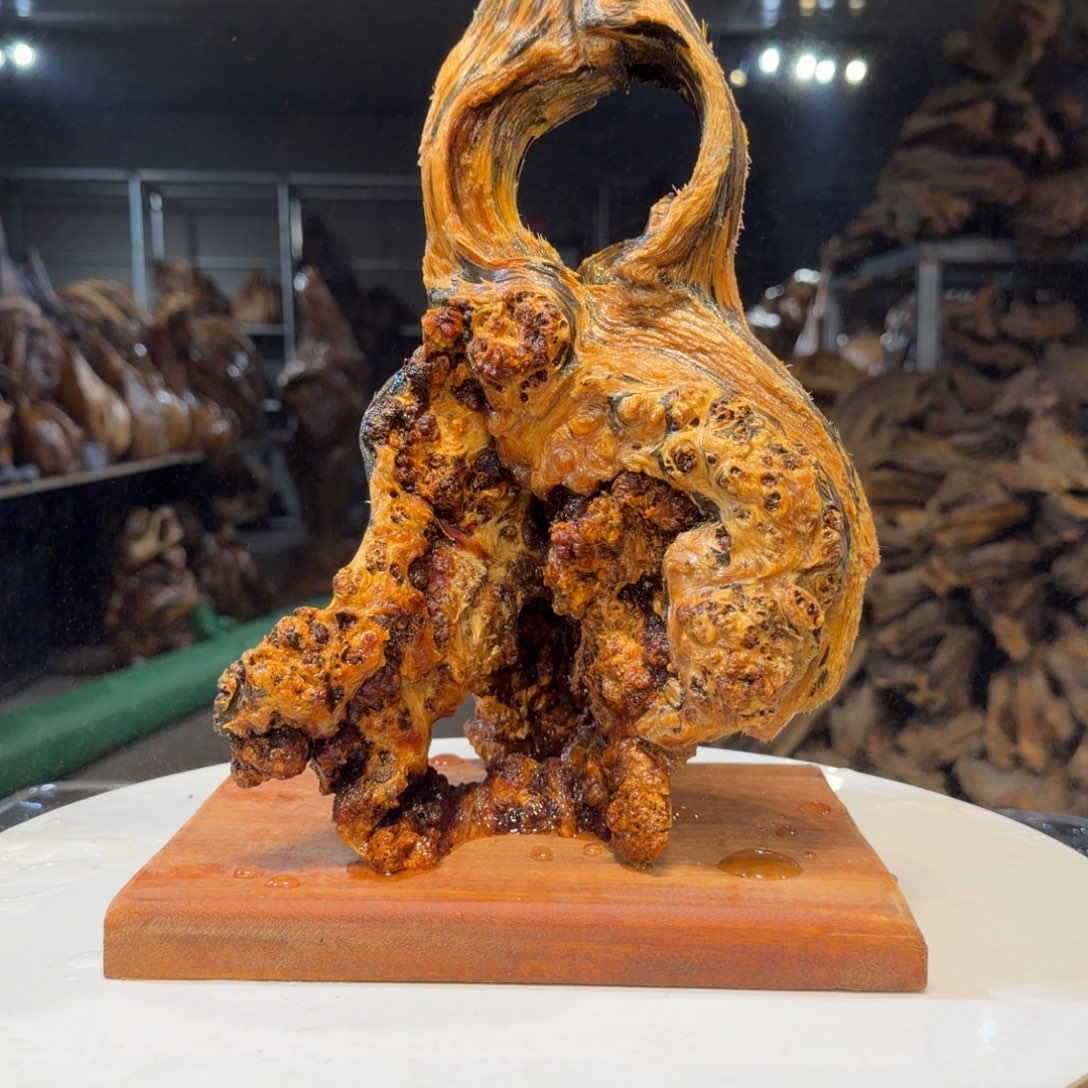 百***蒂木王一刀琥珀木摆件41
