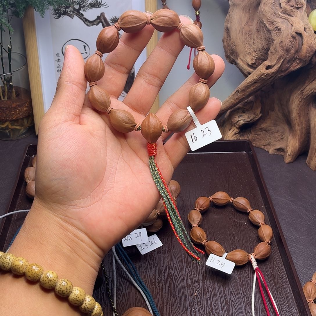 乐***生橄榄核手串/手链梅林铁核16.23头货