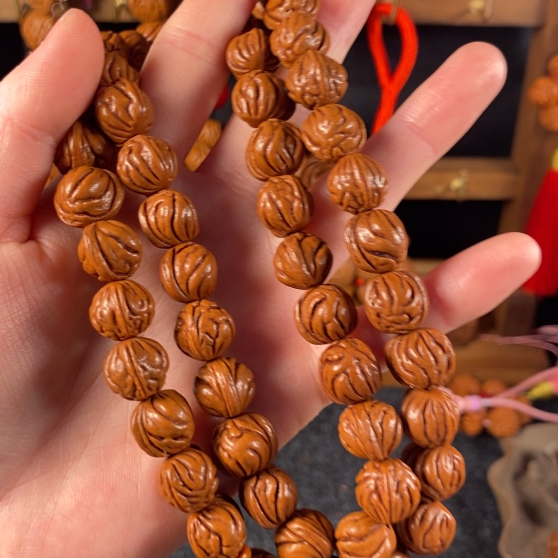 吊坠桃核桃枭手串10