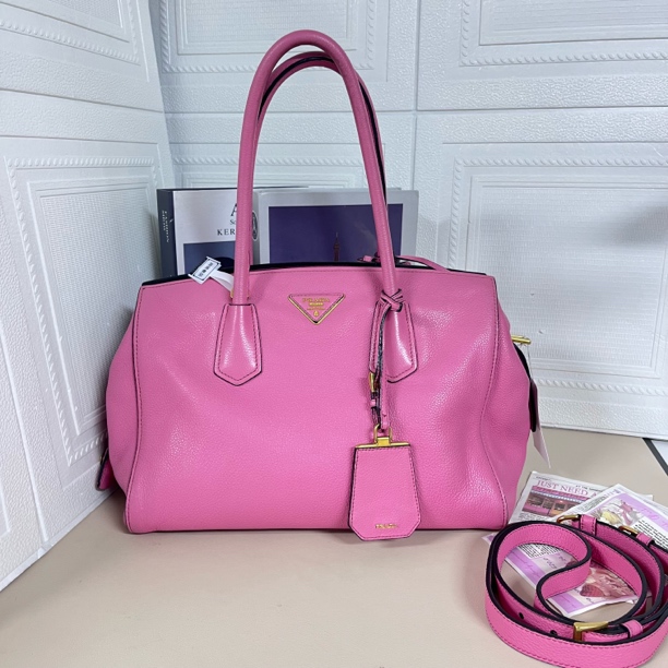 95新 Prada/普拉达 粉金粒面手提斜挎包