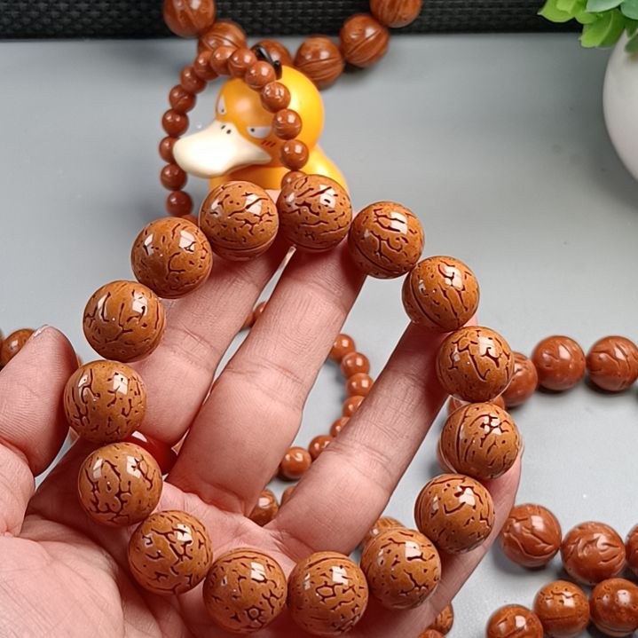 8***8桃核手串铁籽鸡蛋黄满花16