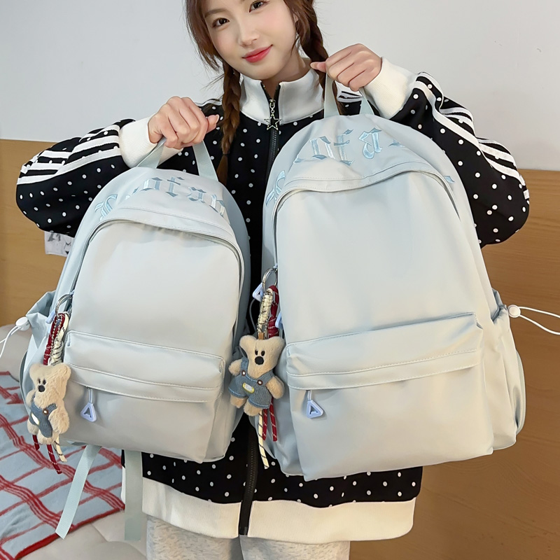 日系纯色双肩包女休闲百搭双肩背包学院风书包小学初中大学简约风