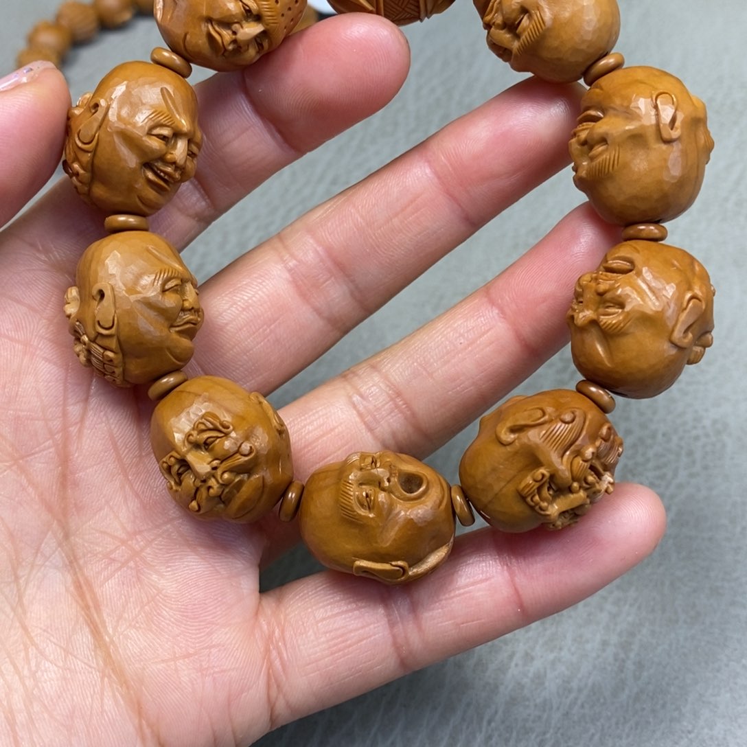 橄榄核吊坠须派罗汉