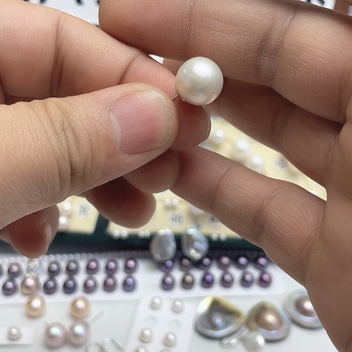 吃***颂耳饰银S925镶嵌淡水珍珠