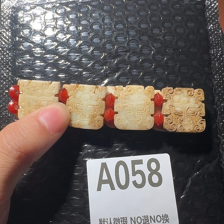 叶***光有机玻璃工艺品兽面摆件