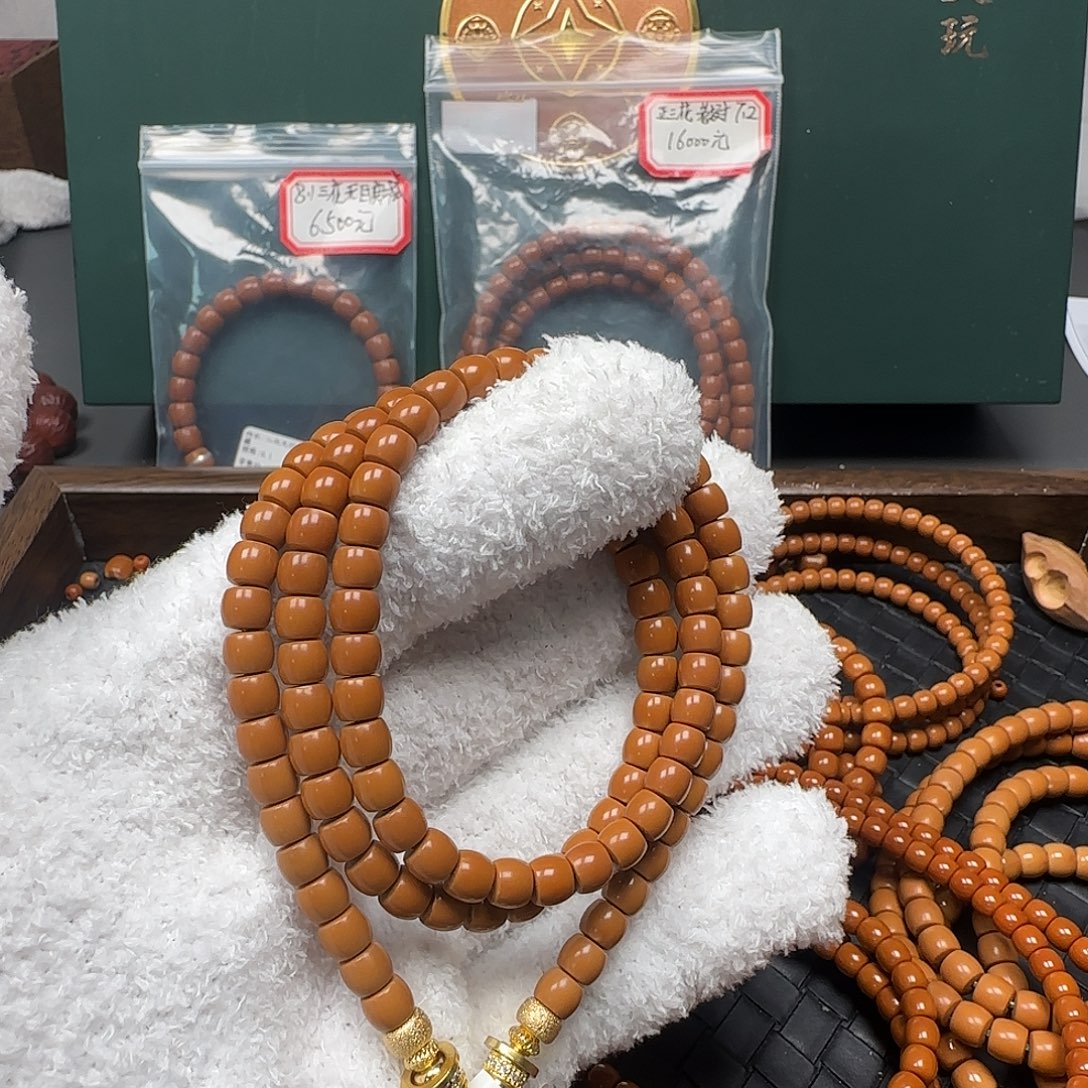 中***-橄榄核吊坠6.3mm老挝核尖直切108