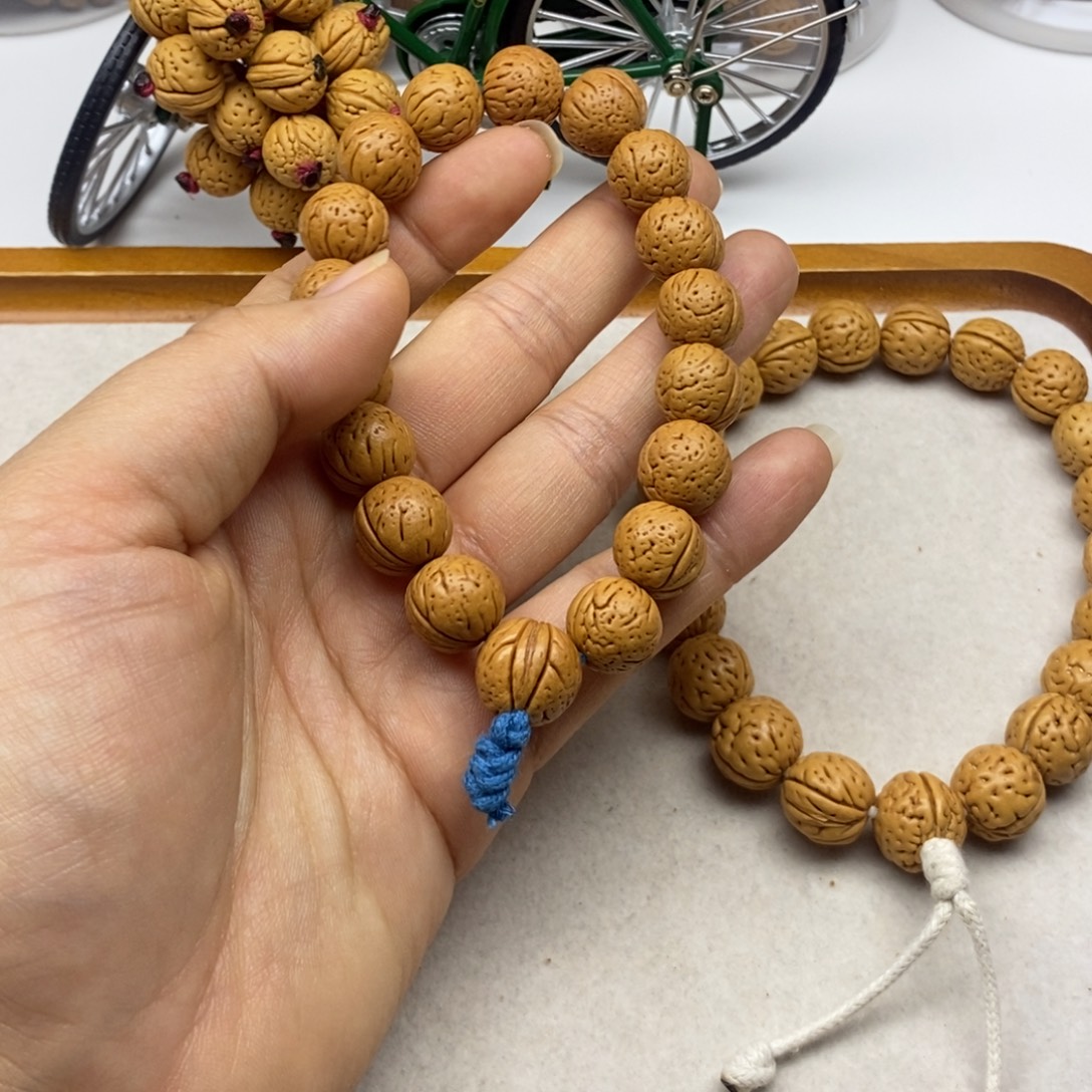 M***宋吊坠桃核内蒙光头强