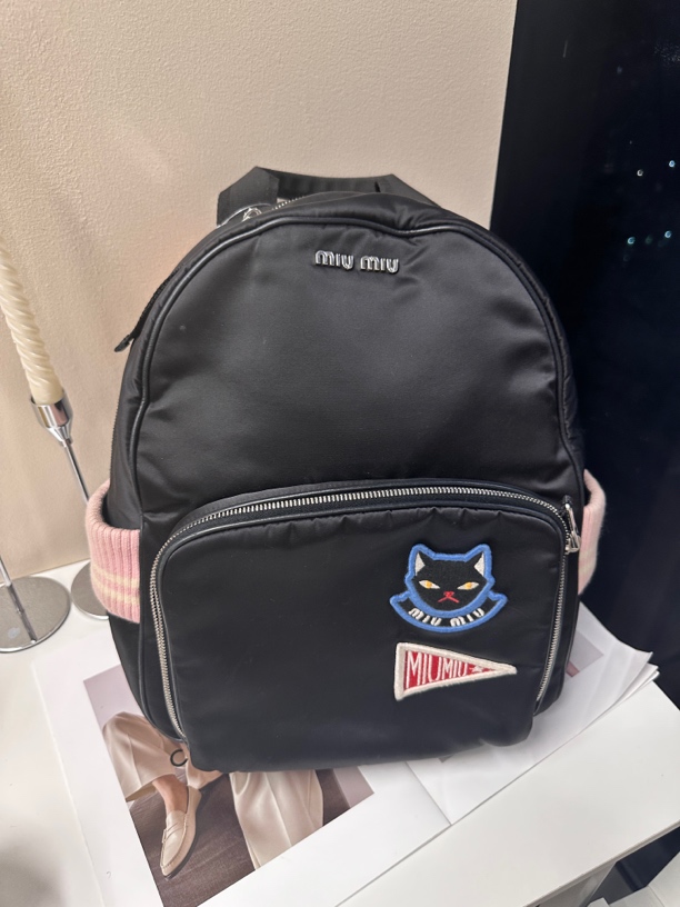 95新 MIU MIU/缪缪 黑色双肩背包时尚实用出行必备