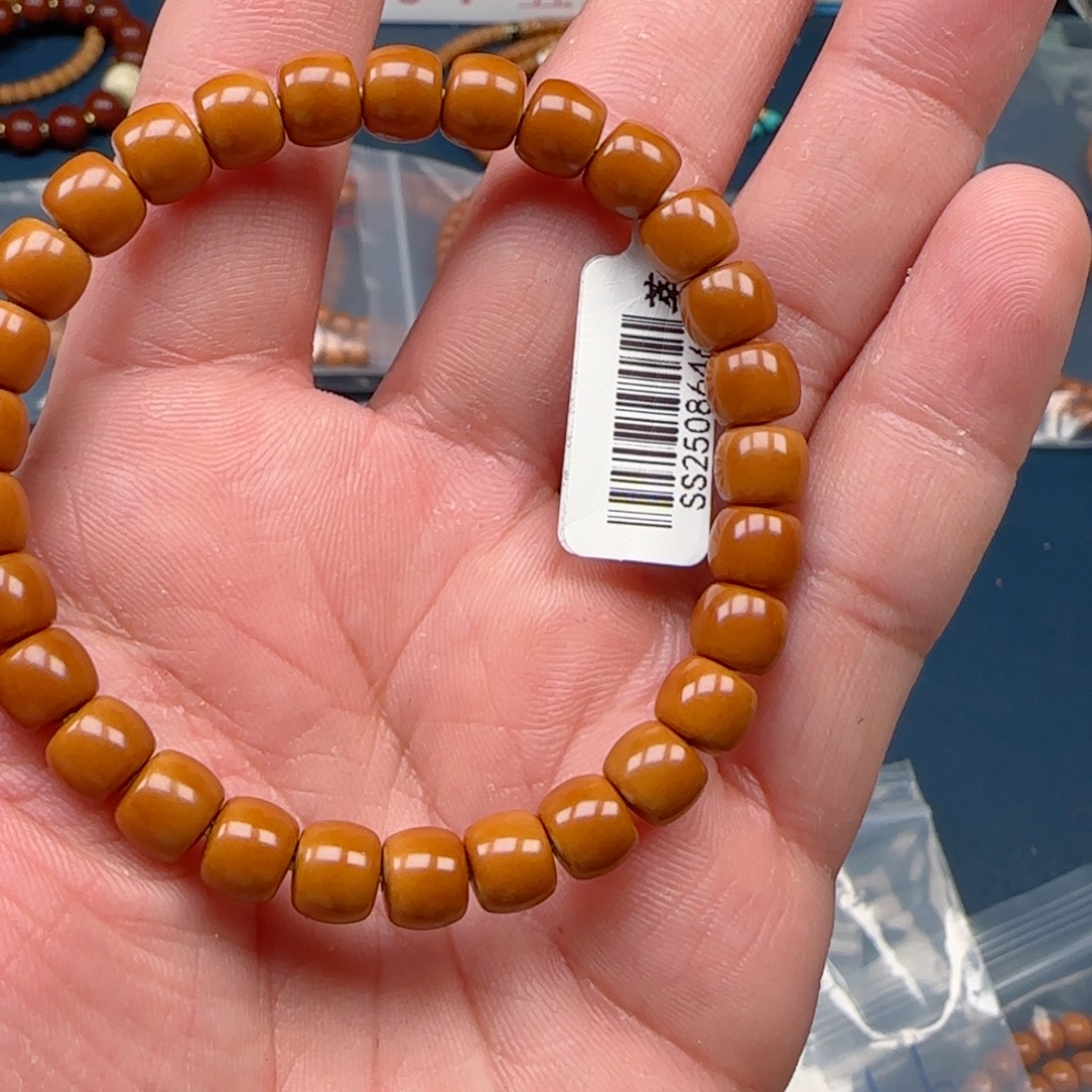 _***、手串橄榄核老挝SSS级核尖极限弧尺寸7.7