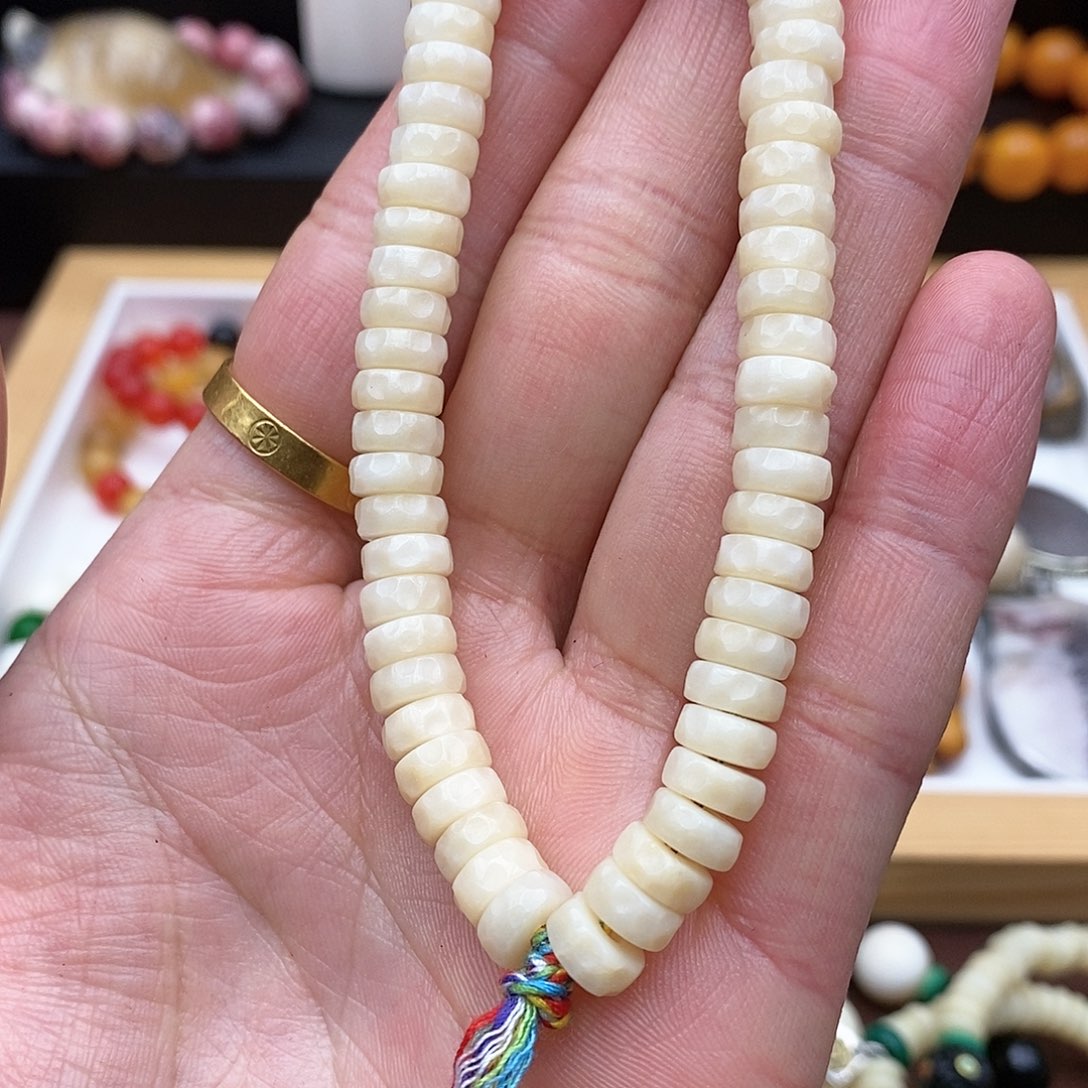 驼骨手串/手链8×4mm驼骨鸡油黄