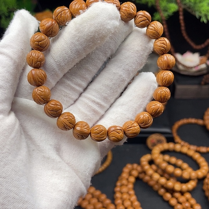 H***H吊坠桃核秦岭龙纹桃核