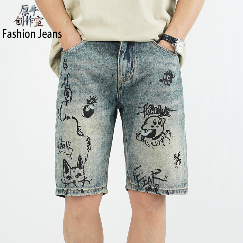 新款美式街头涂鸦印花牛仔中裤男士夏季宽松潮牌百搭五分裤子