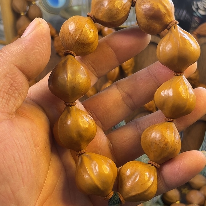 笑***a橄榄核手串梅林铁佛