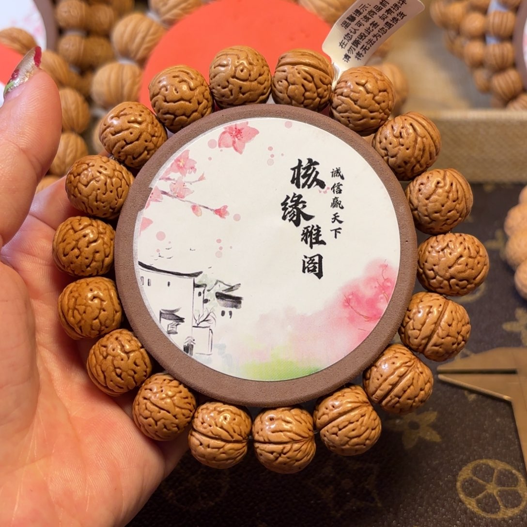 彦***慕桃核手串6号链接。