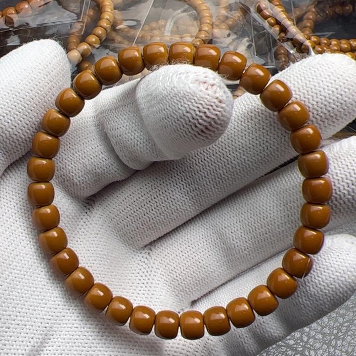 李***闹橄榄核吊坠老挝核尖单圈6.6全品