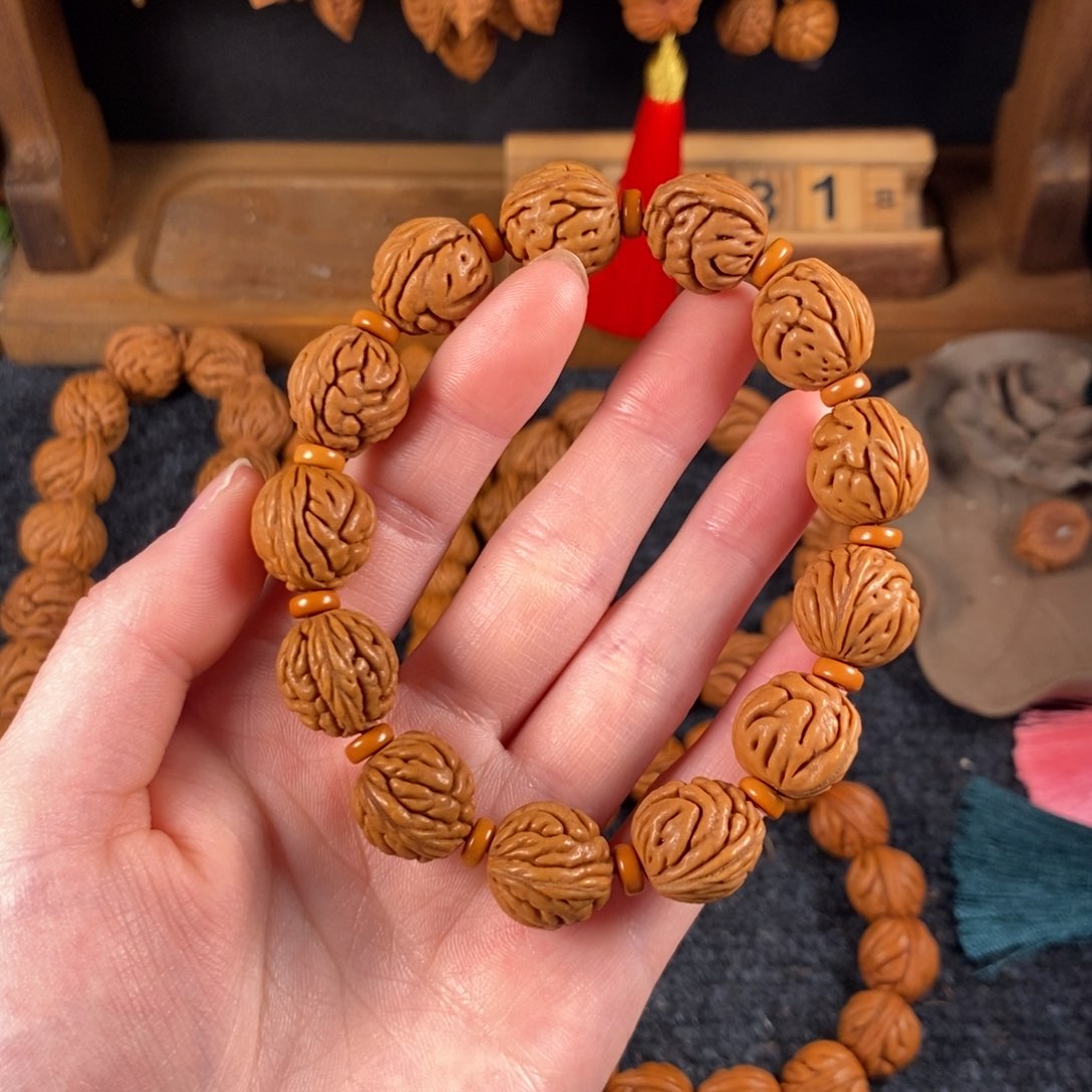 吊坠桃核桃枭手串