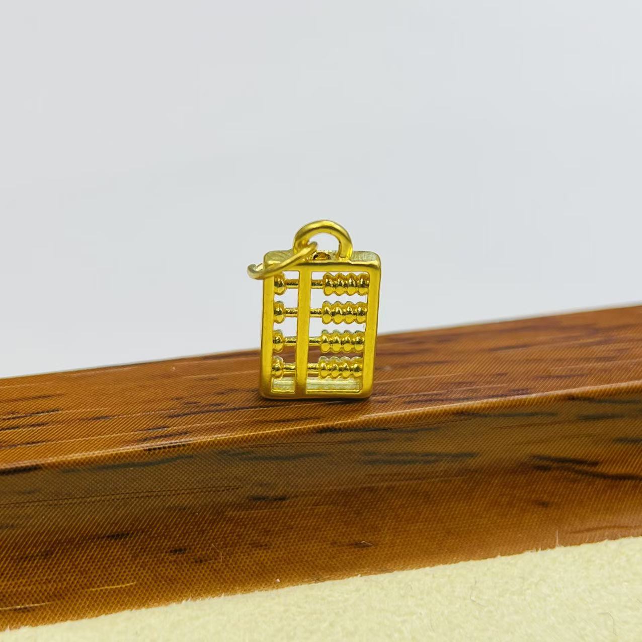 新金社黄金足金999算盘DP0048