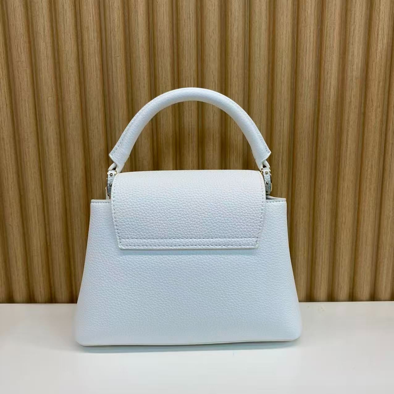 HM920 25新款米白色手提时尚包