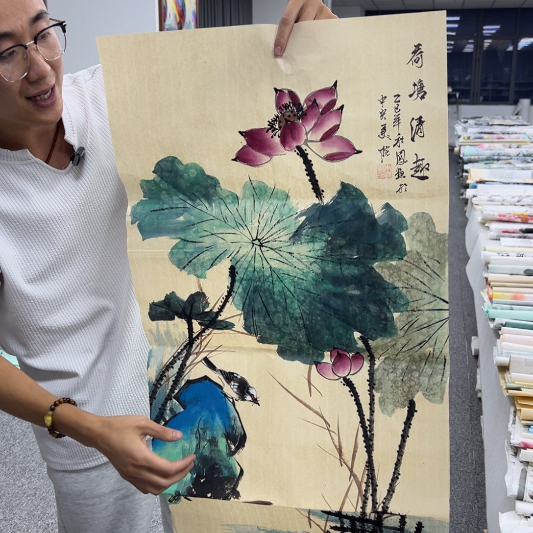 国画卖字画的小男孩