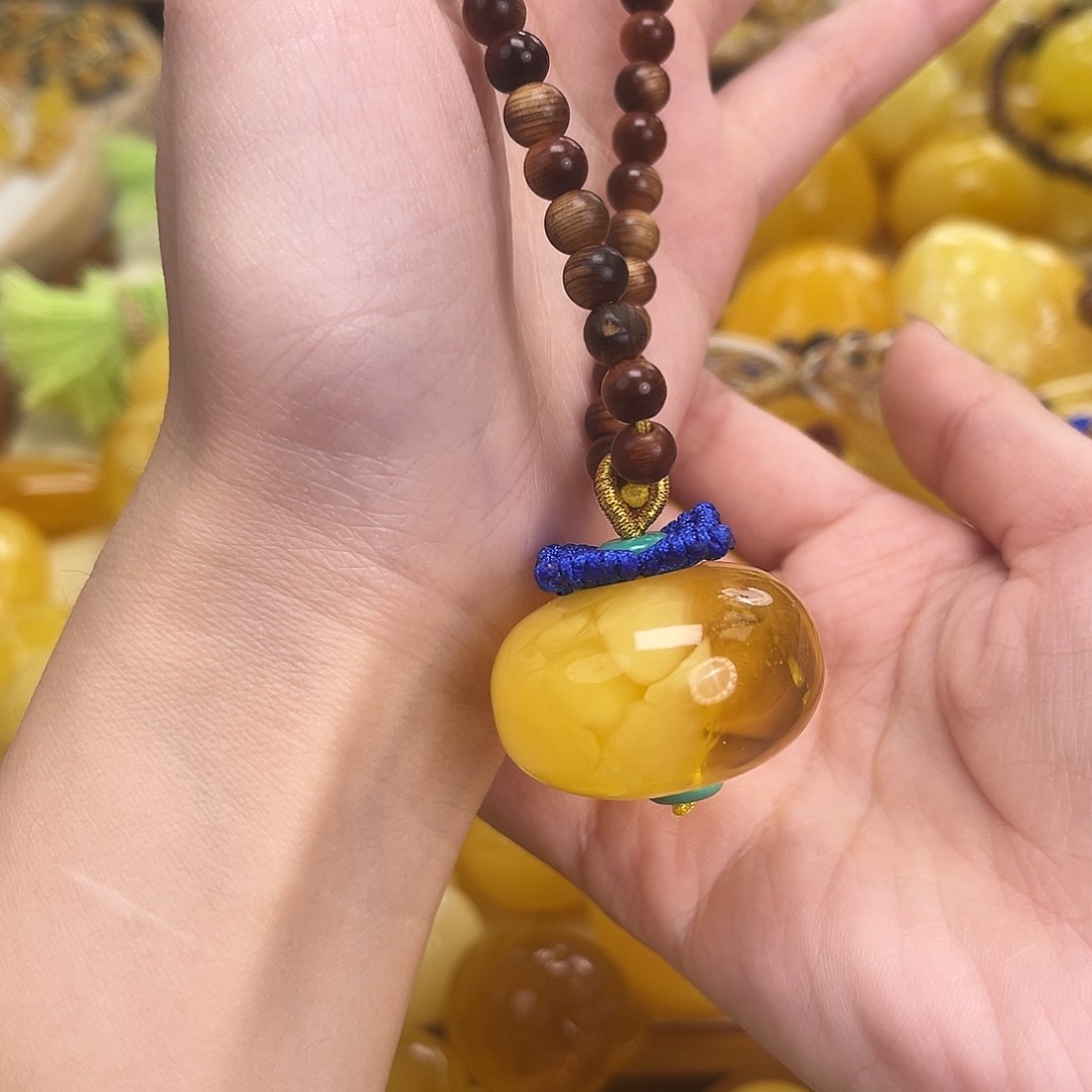 裸石琥珀未镶嵌半山水柿子手把件15.5g