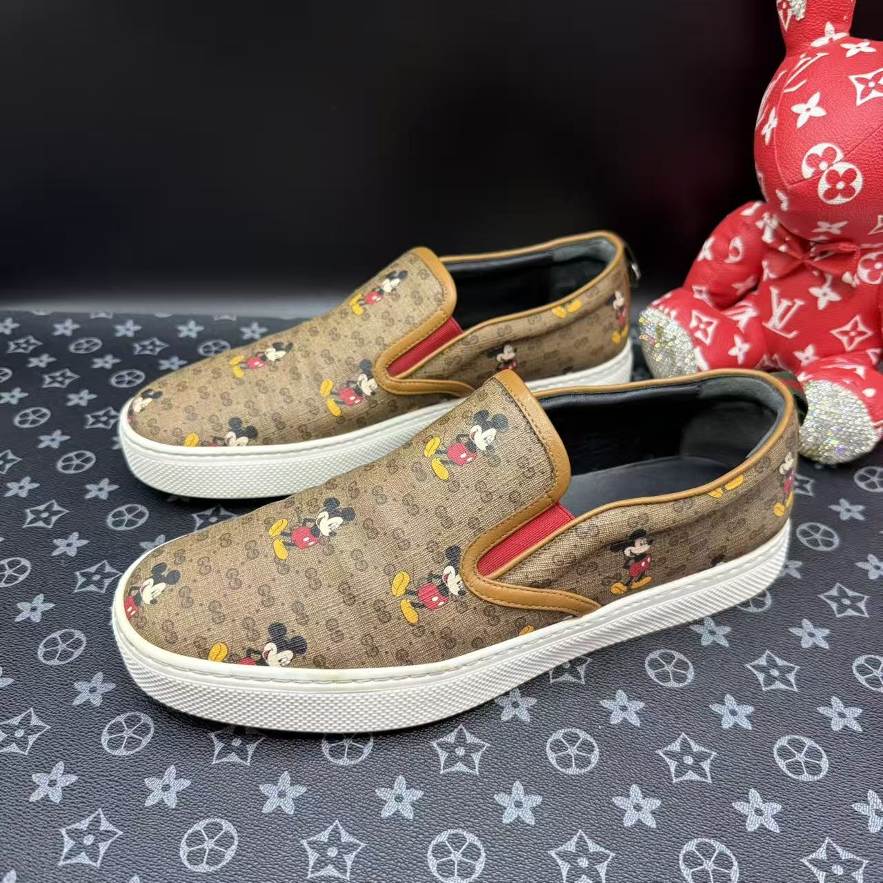 95新 GUCCI/古驰 男士棕老花米老鼠印花一脚蹬42.5欧码 ddm3211